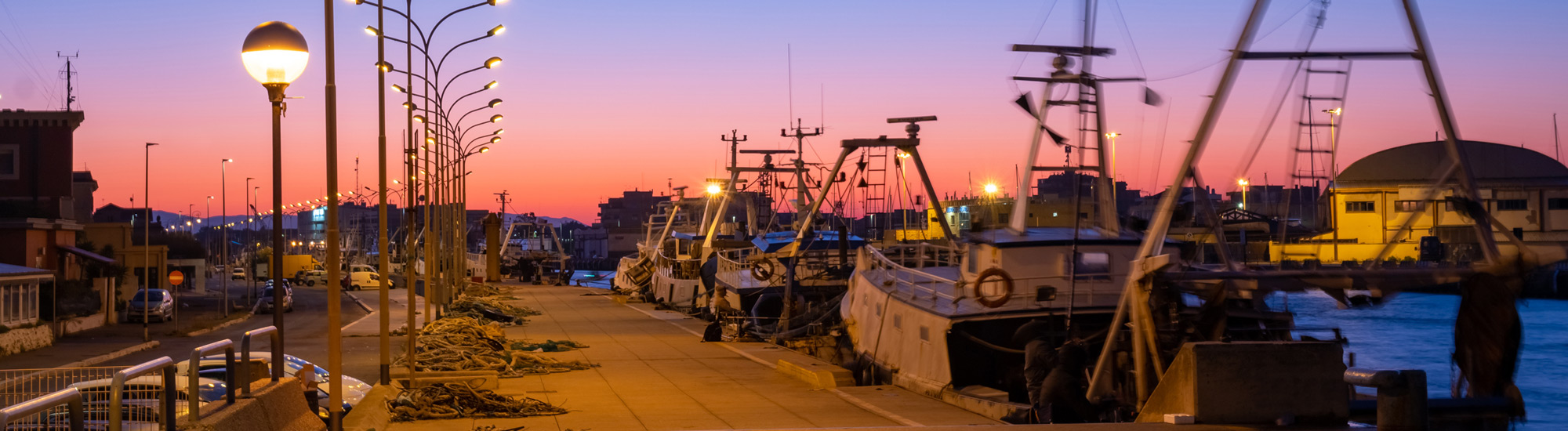 Scorcio del porto di Fiumicino al tramonto - Foto di k_samurkas da Adobe Stock